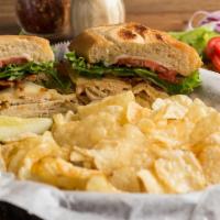 Chicken Club Sandwich · Oven roasted chicken, bacon, honey mustard, Swiss cheese, Cheddar cheese, lettuce, tomatoes,...