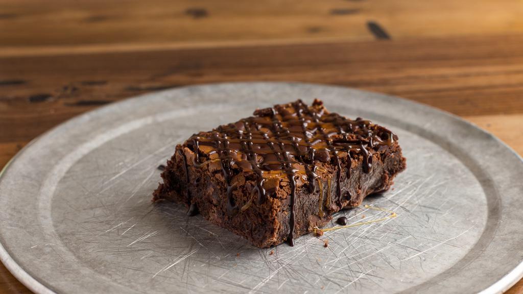 Fudge Brownie · Decadent is the only word for this brownie. Hot and drizzled with chocolate and caramel, it'll satisfy any sweet tooth.
