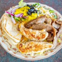 Mix Grill · Gyros and chicken over top rice, your choice of salad (Greek, tabouli, mint, or cucumber), p...
