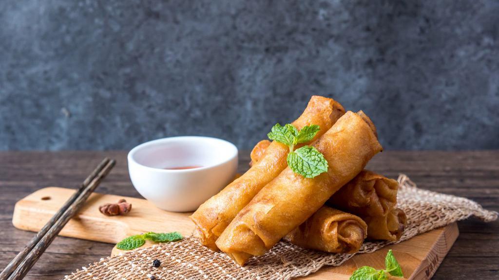 Chicken Egg Roll · Crispy egg roll filled with cabbage and  minced chicken.
