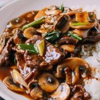 Beef With Mushrooms · Tender beef and mushrooms served with  white rice.