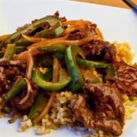 Beef With Mixed Vegetables · Tender beef and vegetables served with  white rice.