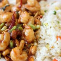 Kung Pao Shrimp · Plump shrimp, peanuts, and vegetables, and chili peppers, served with white rice.