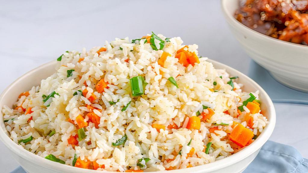 Vegetable Fried Rice · Rice with snow peas, mushroom, pea, carrots, onions, and broccoli.
