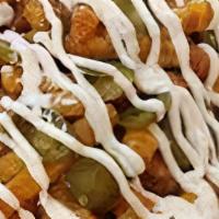 Cafe Fries · Crispy fries topped with roast beef debris gravy cheddar cheese sour cream and jalapeños