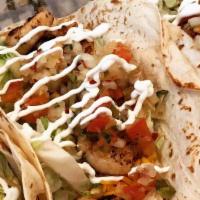 Shrimp Tacos · tacos come (3) per order 
grilled fried or blackened
lettuce cheese sour cream and fresh mad...