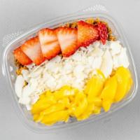 Island Berry Bowl · Acai blended with mangos, strawberries, and coconut water. Topped with granola, honey, mango...