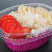 Pitaya Paradise · Pitaya blended with strawberries and bananas and almond milk. Topped with granola, bananas, ...
