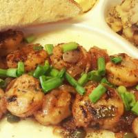 Shrimp & Grits Breakfast · Sautéed Shrimp Served Over Grits, with Eggs, Hash Browns, & Choice of Biscuit or Toast.