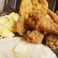 Chicken & Grits Meal · Grits served with eggs, 3 pieces of fried chicken and choice of biscuit or toast.