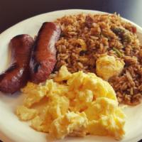 Breakfast Rice · Breakfast rice mixed with all meats, eggs, onions & bell peppers served with 2 sides.