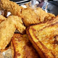 Chicken & French Toast  · 2 slices of buttermilk french toast served with 3 pieces of fried chicken. Served with 2 syr...