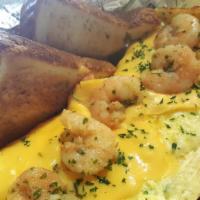Shrimp Omelet  · Stuffed with shrimp, onions, bell peppers & cheese. Served with biscuit or toast.