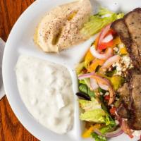 Gyro Platter · Gluten-free. Beef and lamb or chicken. Greek salad, cucumber sauce, and hummus.
