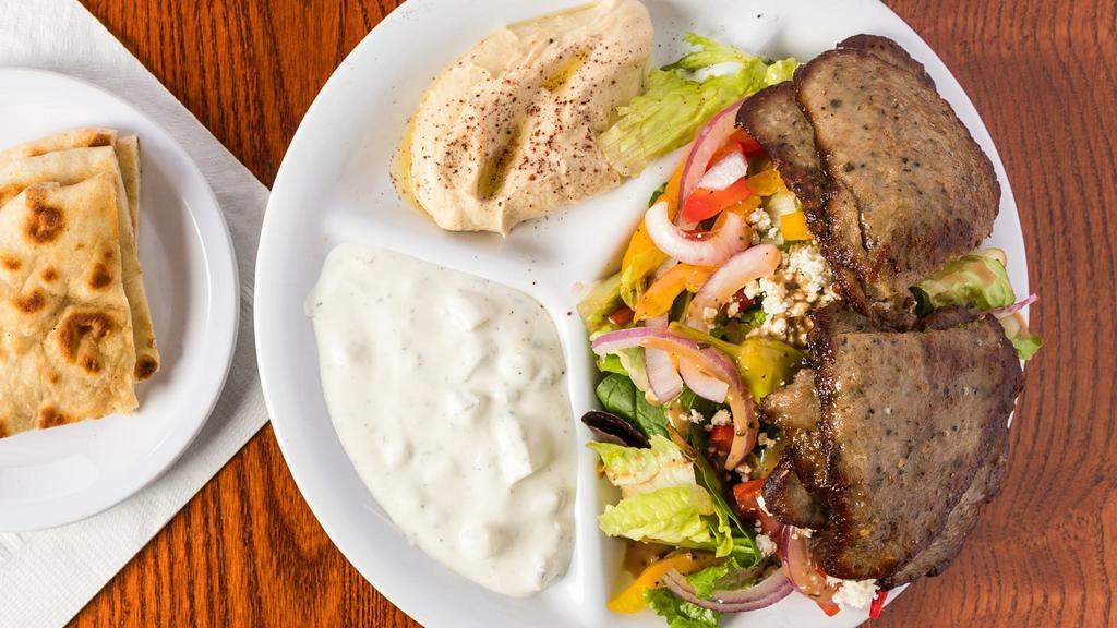 Gyro Platter · Gluten-free. Beef and lamb or chicken. Greek salad, cucumber sauce, and hummus.