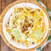 Fajita Nachos · Topped with grilled onions and peppers, covered in cheese dip. Fresh and crisp delicious hom...