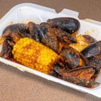 1/2Lb Black Mussels  · Includes red potato and corn on cob and your choice of seafood flavor.