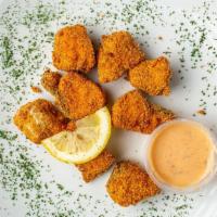 Salmon Nuggets · Breaded or battered crispy chicken.