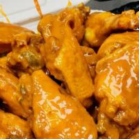 15 Piece Wings · 3000 cal. 15 party wings, bone-in. Seasoned to a great taste. You can dip them in buffalo sa...