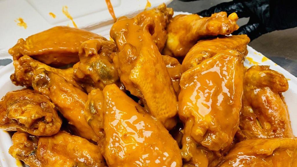 15 Piece Wings · 3000 cal. 15 party wings, bone-in. Seasoned to a great taste. You can dip them in buffalo sauce or honey gold sauce. Add ranch or honey mustard as a side.