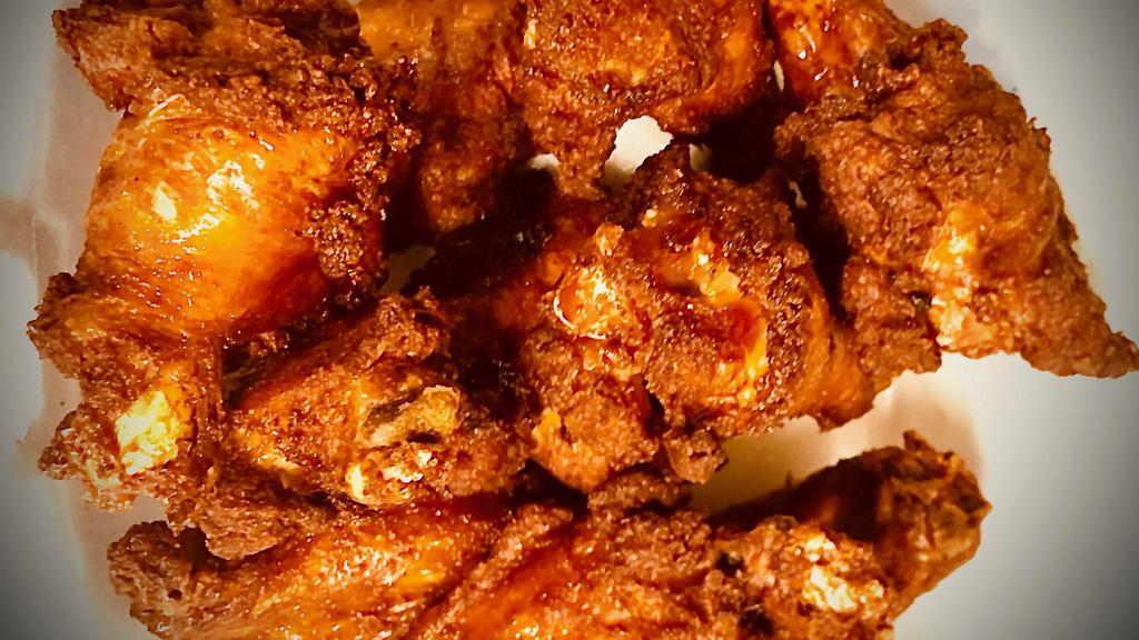 20 Piece Wings · 3400 cal. 20 party wings bone-in. Seasoned to a great taste. You can also dip them in either buffalo or honey gold sauce. Add ranch or honey mustard as a side.