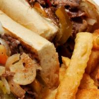 Philly Cheese Steak · Shredded steak with grilled onions and peppers, melted provolone, and mayonnaise on a toaste...