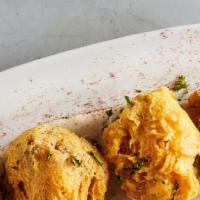 Crab Stuffed Beignets · Crabcakes hand-dipped in tempura batter, lightly fried, remoulade dressing.