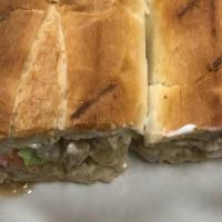 Philly Cheese Steak Sub · Fresh thin sliced rib-eye with sweet onions. Served toasted with mayonnaise, lettuce, tomato...