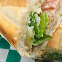 Turkey And Provolone Sub · Top quality smoked turkey breast. Served toasted with mayonnaise, lettuce, tomato, onions, a...