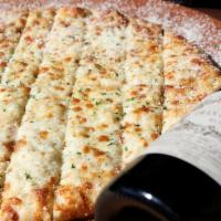 Famous Asiago Cheese Bread · Tony’s favorite, garlic olive oil glaze, three cheeses, golden baked and served with classic...