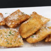 Toasted Ravioli · Italian cheese filled ravioli, lightly breaded. Served with classic red sauce.