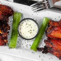 Boom Boom Wings · Dry rubbed and marinated for 24 hours in our special house blend, served with celery & house...