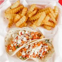 Shrimp Tacos (3) · 3 Shrimp tacos with  pico lettuce tomato cheese special seasonings & sauces