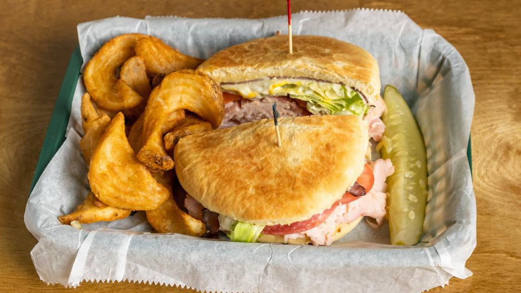 Grady’S Grinder · Ham, turkey breast, salami, and roast beef with mayo, mustard, lettuce, tomato, and cheese.