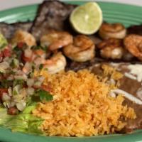 Carne Asada Con Camarones · Roasted steak with shrimp served with rice, bean and salad.