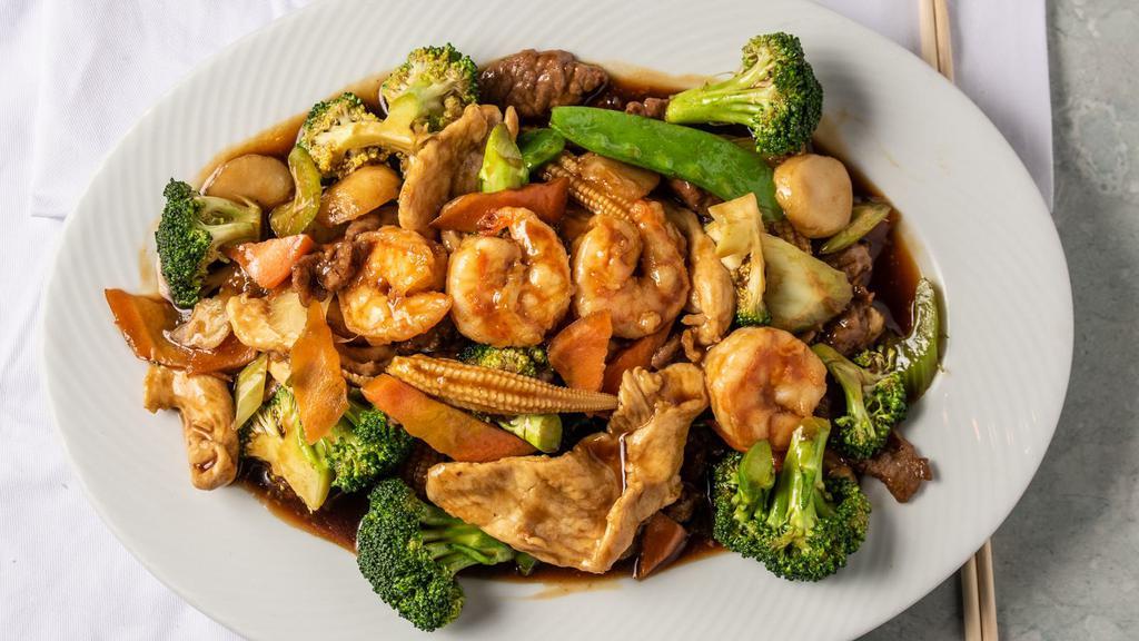 Triple Delight · Tender white chicken, beef, jumbo shrimp sauteed with mixed garden vegetable and broccoli in our special brown sauce.