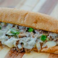 Philly Cheese Steak · A classic philly with grilled, marinated steak, green peppers, onions, mushroom, mayo, and w...