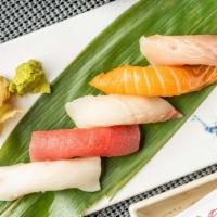 Sushi (Nigiri) Appetizer · Raw. Five pieces of chef sauce of assorted sushi (nigiri).