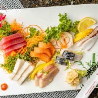 Sashimi Deluxe · Raw. 18 pieces of chef's choice sashimi.