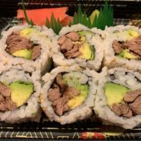 Cowboy Roll · Beef fillet and avocado with spicy creamy sauce on top.