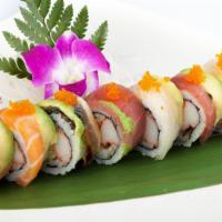 Rainbow Roll · Raw. California roll inside, topped with salmon, tuna, white fish and avocado.