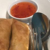 Egg Rolls (2) · Ground chicken and vegetables wrapped in spring roll sheets and deep fried served with sweet...
