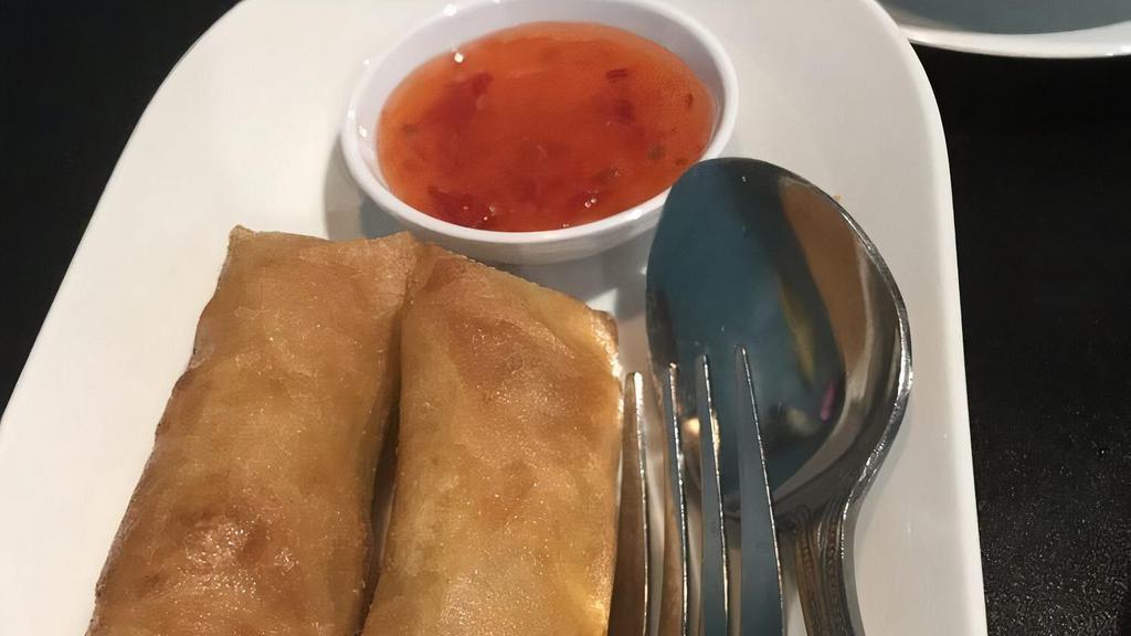 Egg Rolls (2) · Ground chicken and vegetables wrapped in spring roll sheets and deep fried served with sweet and spicy sauce.