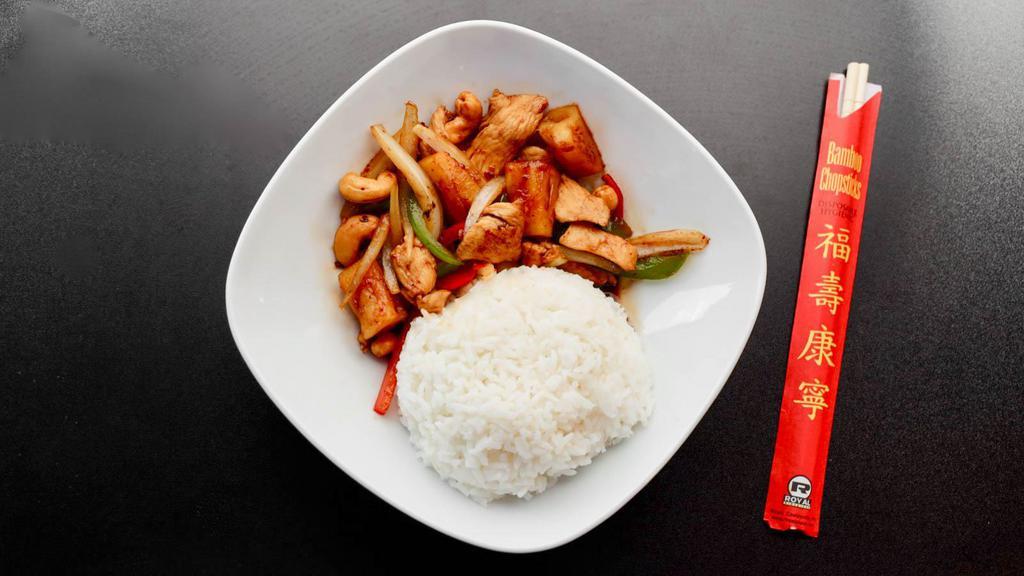 Cashew Chicken · Farmed fresh chicken breast,   stir-fried with roasted whole cashew nuts, bell peppers onions, pineapple in our house chili soy sauce glaze. Served with jasmine rice.