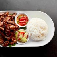 Muai Thai Beef · Marinated USDA choice ribeye, grilled. Served over lettuce with a side of cucumber salad. Se...