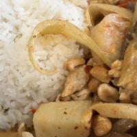 Lunch Massaman Curry · Sweet and Mild Thai curry with potatoes and onions topped with roasted peanuts. Served with ...