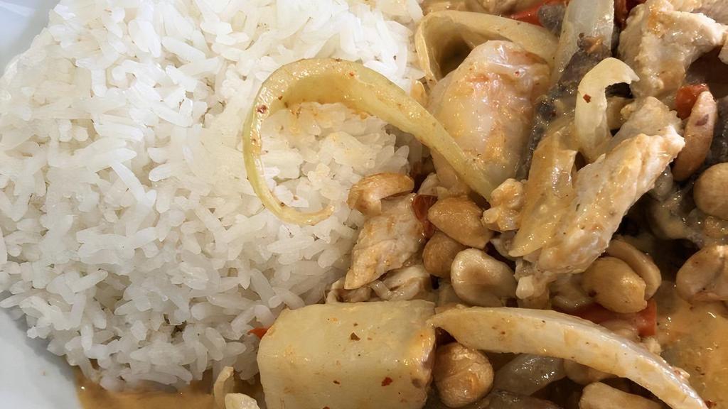 Lunch Massaman Curry · Sweet and Mild Thai curry with potatoes and onions topped with roasted peanuts. Served with Jasmine Rice