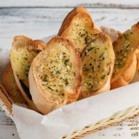 Garlic Bread · Mozzarella cheese, parmesan, garlic, Served with a side of homemade marinara sauce.
