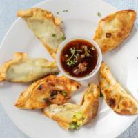 6 Edamame Potstickers · Six tender dumplings filled with a blend of hearty edamame soybean pieces and lightly season...