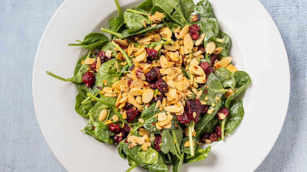 Full Cranberry Spinach Salad · Fresh spinach, dried cranberries and spiced almonds tossed with a sweet poppy seed dressing. (Spicy)